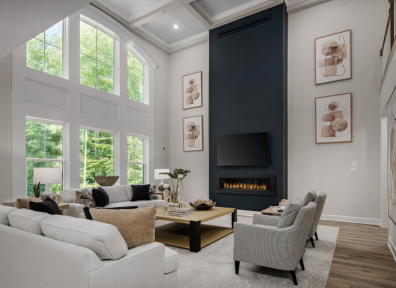 Elegant modern Heartland Homes living room with high ceilings