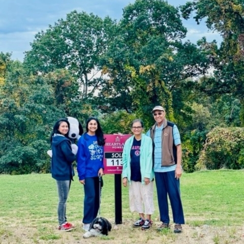 Couple celebrating new home purchase at Heartland Homes lot